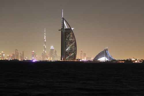 Burj Al Arab by night: Taken from Palm Jumeira- an entirely man made island in the shape of a palm tree (http://en.wikipedia.org/wiki/Palm_Islands). The Burj Al Arab is actually built on its own man-made island in the Gulf. *