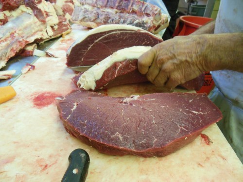 London Broils being cut from the top round.  Good marbling for grass-fed beef. 
